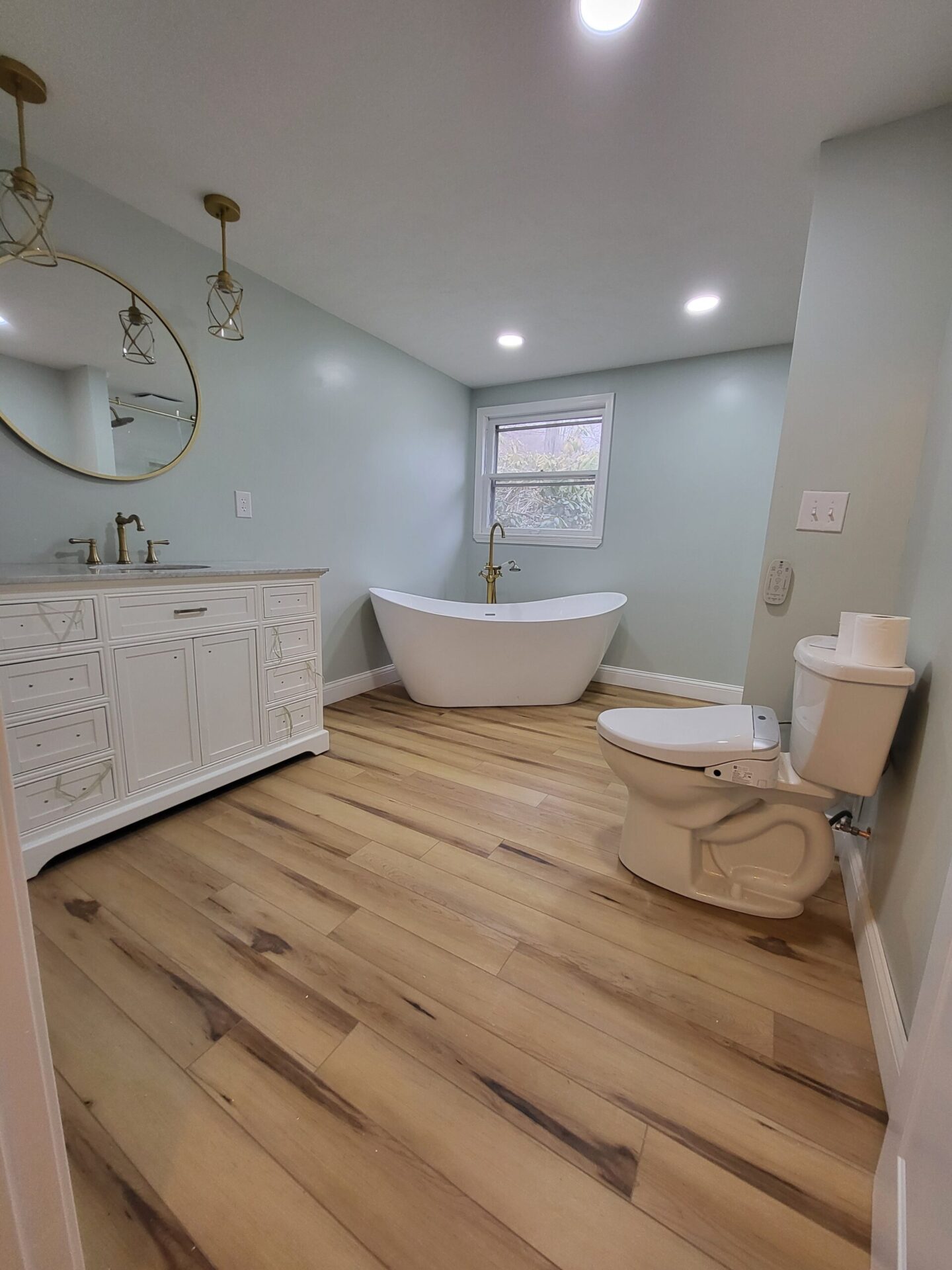 Complete bathroom renovation with free-standing tub
