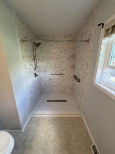 Walk in shower with solid surface Samuel Mueller walls Walk in shower with Samuel Mueller walls