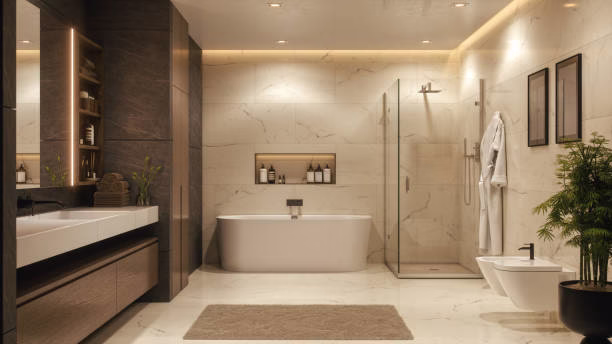 Luxurious modern bathroom featuring marble surfaces, a bathtub, and a glass shower. The soft lighting and minimalist design create a serene and luxurious ambiance.