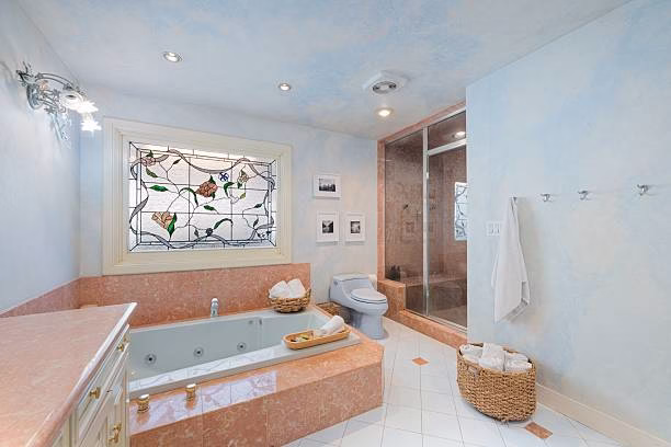 Modern bathroom design featuring upgraded vanity and fixtures