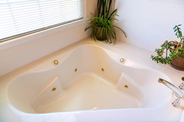 Updated bathroom featuring a stylish soaking tub