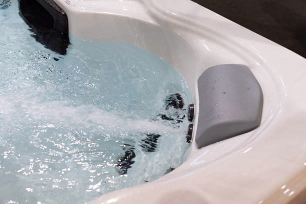 Bathroom renovation showcasing a newly installed acrylic bathtub