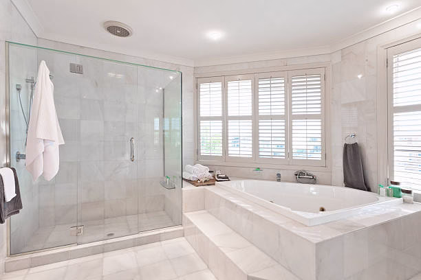 Updated bathroom featuring a stylish soaking tub